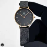 ساعت مچی زنانه دنیل ولینگتون قاب رزگلد صفحه مشکی مدل DW12 Daniel Wellington