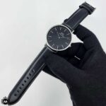 ساعت مردانه دنیل ولینگتون بند مشکی قاب نقره ای Daniel Wellington DW25G