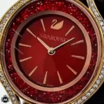 ساعت مچی زنانه سواروسکی رزگلد صفحه قرمز Swarovski SW56L