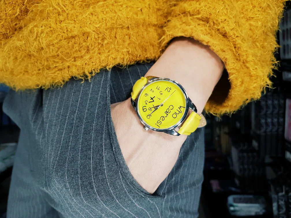 Classic yellow wristwatch in hand 3